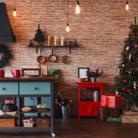 christmas kitchen decor. cooking festive food in the kitchen. new year. christmas. christmas decor. christmas tree. christmas background. christmas home interior decor. holiday. loft style kitchen. - home decoration stock pic
