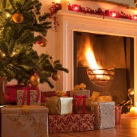 christmas tree and stocking near fireplace - home decoration stock pictures, royalty-free photos & images