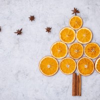 christmas tree made of slices of dried oranges, cinnamon sticks and star anise. stock photo - home decoration stock pictures, royalty-free photos & images