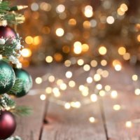 christmas tree, red and green ornaments against a defocused lights background - home decoration stock pictures, royalty-free photos & images