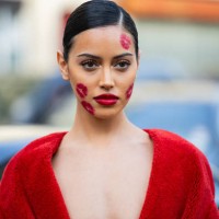 Cindy Kimberly with kiss lip make up wears red dress outside Viktor&Rolf during the Haute Couture Spring/Summer 2024 as part of Paris Fashion Week on...
