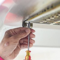 clean the oil stains on the kitchen hood.kitchen range hood heavily soiled with stubborn grease and oil stains, showcasing one of the most frustrating household cleaning challenges. - home decoration stock pictures, royalty-f