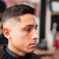 client with his new look in the barber shop - hairstyle stock pictures, royalty-free photos & images