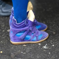 Close-up detail view of blue and purple ankle sneakers shoes with suede details, outside Magliano, during the Milan Fashion Week Menswear Fall/Winter...