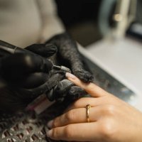 close-up: nail polish removal in beauty salon - nails art stock pictures, royalty-free photos & images