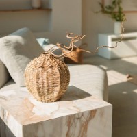 close-up of a wicker vase on a coffee table in a living room - home decoration stock pictures, royalty-free photos & images