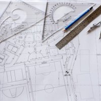 close-up of architect engineer drawing plan on blueprint with architect equipment - home decoration stock pictures, royalty-free photos & images