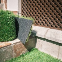 close-up of artificial grass carpet use as garden flouring or floor mat for office and home use - garden decoration stock pictures, royalty-free photos & images