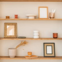 close-up of assorted ornaments, vases and mirrors on shelves - home decoration stock pictures, royalty-free photos & images