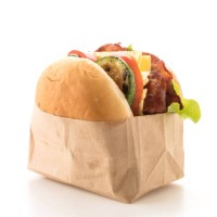 close-up of bacon burger on white background - junk food stock pictures, royalty-free photos & images