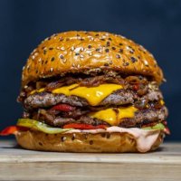 close-up of burger on table,indonesia - junk food stock pictures, royalty-free photos & images
