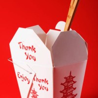 close-up of chopsticks in a chinese takeout box - junk food stock pictures, royalty-free photos & images