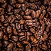 close-up of coffee beans background - coffee stock pictures, royalty-free photos & images
