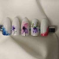 close-up of colorful artificial nails with nail art on them - nails art stock pictures, royalty-free photos & images