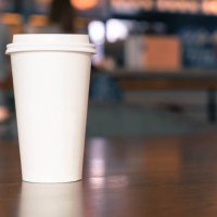 close-up of disposable cup on table - junk food stock pictures, royalty-free photos & images
