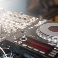 close-up of dj playing record - concert stock-fotos und bilder
