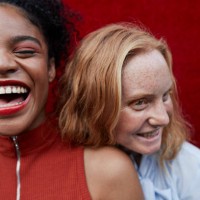 close-up of happy young females standing outdoors - fashion stock pictures, royalty-free photos & images