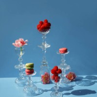 close-up of macarons and pink flowers on the blue background - food stock pictures, royalty-free photos & images