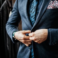 close-up of man buttoning up suit - fashion stock pictures, royalty-free photos & images