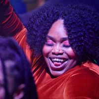 close-up of woman dancing at a music venue. - concert stock pictures, royalty-free photos & images