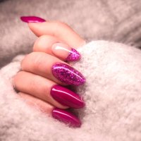 close-up of woman fingers with nail art manicure in pink colour for new years party - nails art stock pictures, royalty-free photos & images