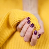 close-up of woman fingers with nail art. maroon nail polish - nails art stock pictures, royalty-free photos & images