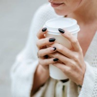 close-up of woman's hands with take away drink - junk food stock pictures, royalty-free photos & images