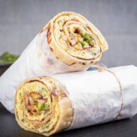 close-up of wrap sandwich on table,united arab emirates - junk food stock pictures, royalty-free photos & images