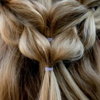 close-up on a beautiful braided hairdo - hairstyle stock pictures, royalty-free photos & images