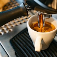 close-up on a coffee maker making a espresso - coffee stock pictures, royalty-free photos & images