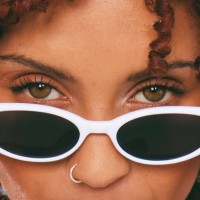 close-up portrait of a cool young woman's eyes - fashion stock pictures, royalty-free photos & images