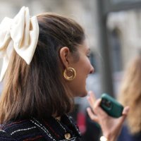 Close-up view of a bow tie hair detail , outside Chanel, during the Womenswear Spring/Summer 2024 as part of Paris Fashion Week on October 03, 2023...