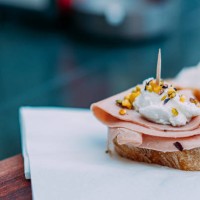 close-up view of a venetian cicchetti with mortadella, baccalà mantecato, and pistachio in venice, italy - food stock pictures, royalty-free photos & images
