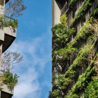 close up exterior of a green sustainable building covered with blooming plants - garden decoration stock pictures, royalty-free photos & images