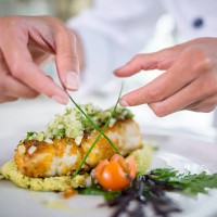 close up of a chef decorating a plate - food stock pictures, royalty-free photos & images
