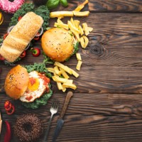 close up of fast food snacks and drink on table - food stock pictures, royalty-free photos & images