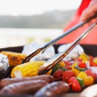 close up of man grilling food on barbecue - food stock pictures, royalty-free photos & images
