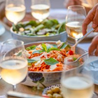 close up of serving spaghetti bolognese on a table at sunset. - food stock pictures, royalty-free photos & images