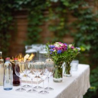 close up of table ready for family dinner outdoors in garden. - garden decoration stock pictures, royalty-free photos & images