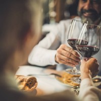 close up of toasting with wine in a restaurant! - food stock pictures, royalty-free photos & images