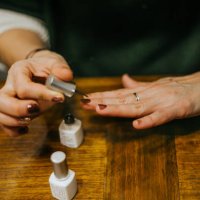 close up of woman with long, slender fingers, paints her nails at home - nails art stock pictures, royalty-free photos & images
