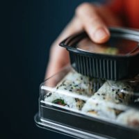close up photo of woman hands holding takeaway food boxes - junk food stock pictures, royalty-free photos & images
