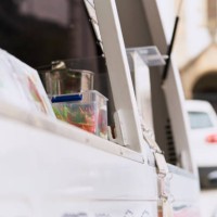 close up view of empty food truck door ice cream at summer in the street - junk food stock pictures, royalty-free photos & images