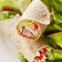 club sandwich wrap with garden salad - junk food stock pictures, royalty-free photos & images