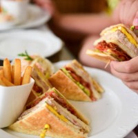 club sandwiches, french fries and coleslaw - junk food stock pictures, royalty-free photos & images