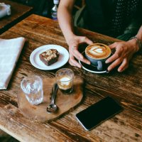 coffee and cake on the table in a cafe in london downtown - coffee stock pictures, royalty-free photos & images