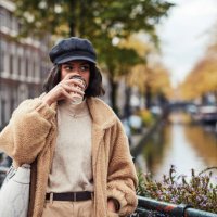 coffee keeps the autumn chill away - junk food stock pictures, royalty-free photos & images