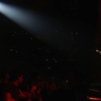 Cole performs on stage for his 