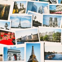 collection of instant travel holiday photos of paris on a table - travel stock pictures, royalty-free photos & images