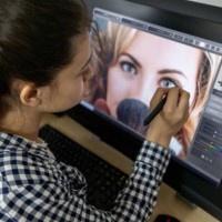 college student retouching a photo in an editing class - fashion stock pictures, royalty-free photos & images
